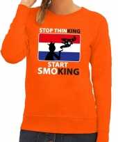 Oranje stop thinking start smoking sweater dames